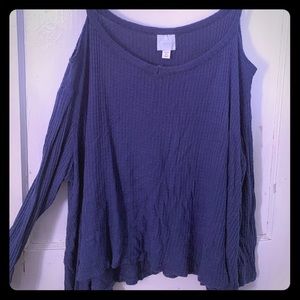 Open shoulder long sleeve shirt.